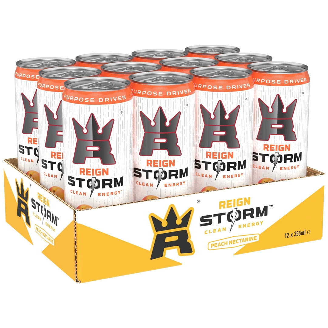12 x Reign Storm Energy 355 ml Peach Nectarine valko-keltaisessa pakkauksessa, jossa on kaksitoista yhteensopivaa energiajuomatölkkiä.