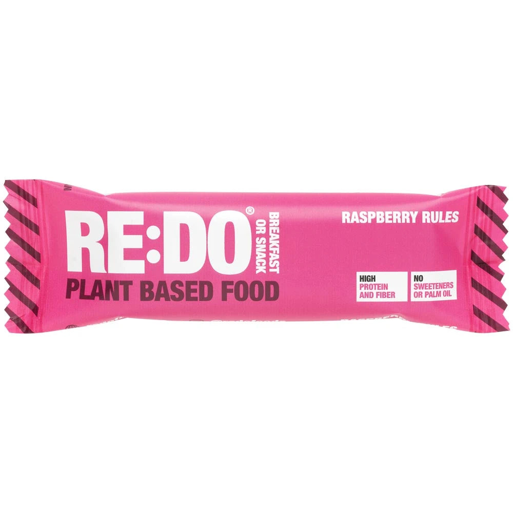 REDO Bar 60 g vegaaninen proteiinipatukka vaaleanpunaisessa pakkauksessa, makuna Raspberry Rules.