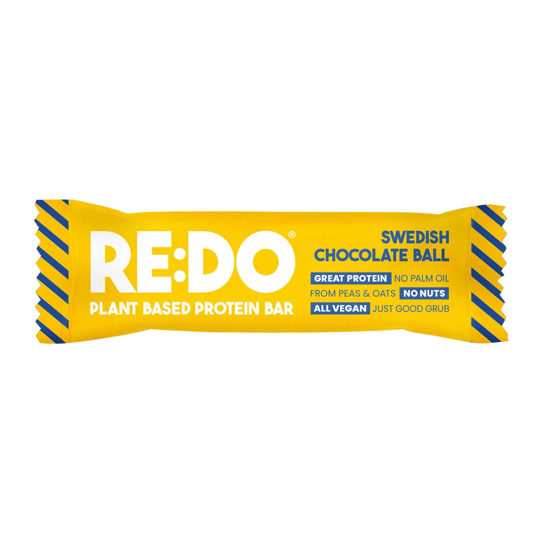 REDO Bar 60 g -vegaaninen proteiinipatukka kelta-sinisessä pakkauksessa, makuna Swedish Chocolate Ball., kuva 4/4