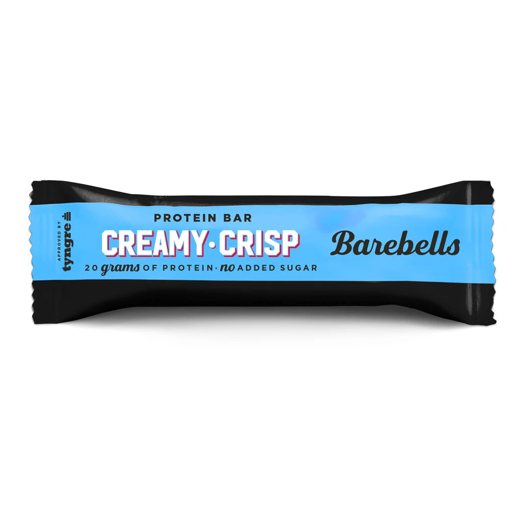 Barebells Soft protein bar 55 g Creamy Crisp mustassa ja vaaleansinisessä pakkauksessa.