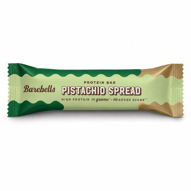 Barebells Soft Protein Bar 45 g vaaleanvihreässä pakkauksessa tummanvihreillä ja ruskeilla yksityiskohdilla, makuna Pistachio Spread., kuva 1/1