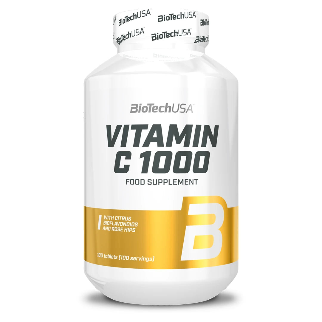 BioTechUSA Vitamin C 1000 100 tabs -vitamiini valkoisessa purkissa kultaisilla yksityiskohdilla.