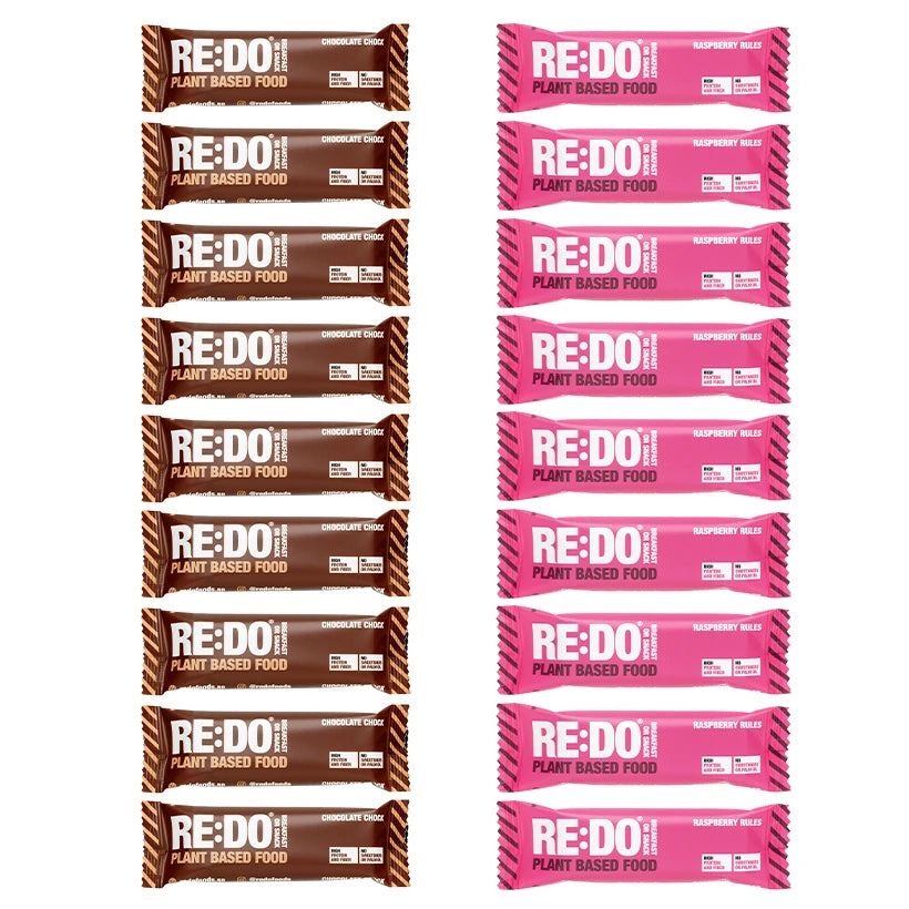 18 x REDO Bar 60 g Mix-laatikko kasvipohjaisia patukoita ruskeissa ja pinkeissä pakkauksissa, suklaa ja vadelma., kuva 1/1