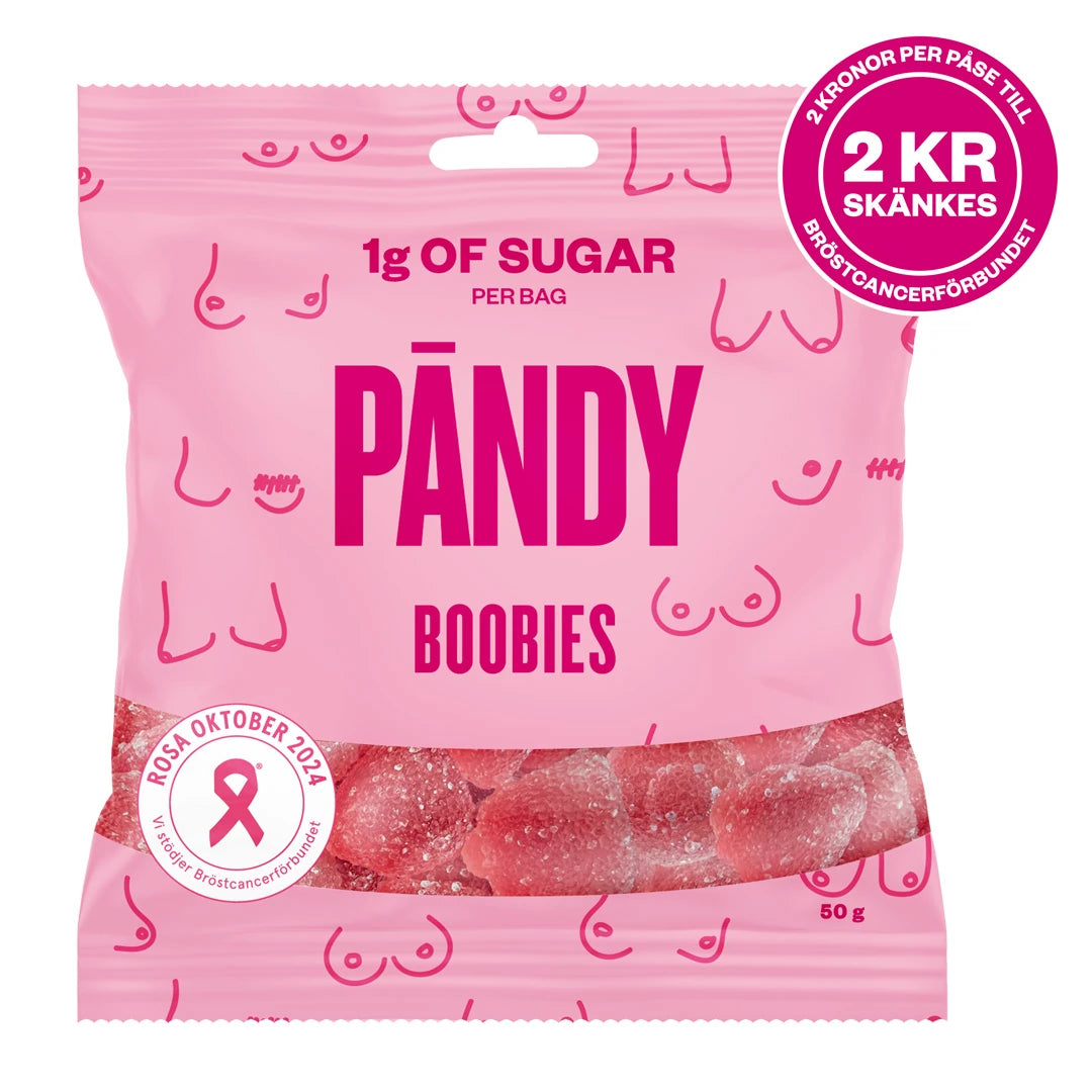 Vaaleanpunainen Pändy Candy 50 g -karkkipussi, jossa on Boobies-teksti, Roosa nauha -logo ja punaisia geelikarkkeja.