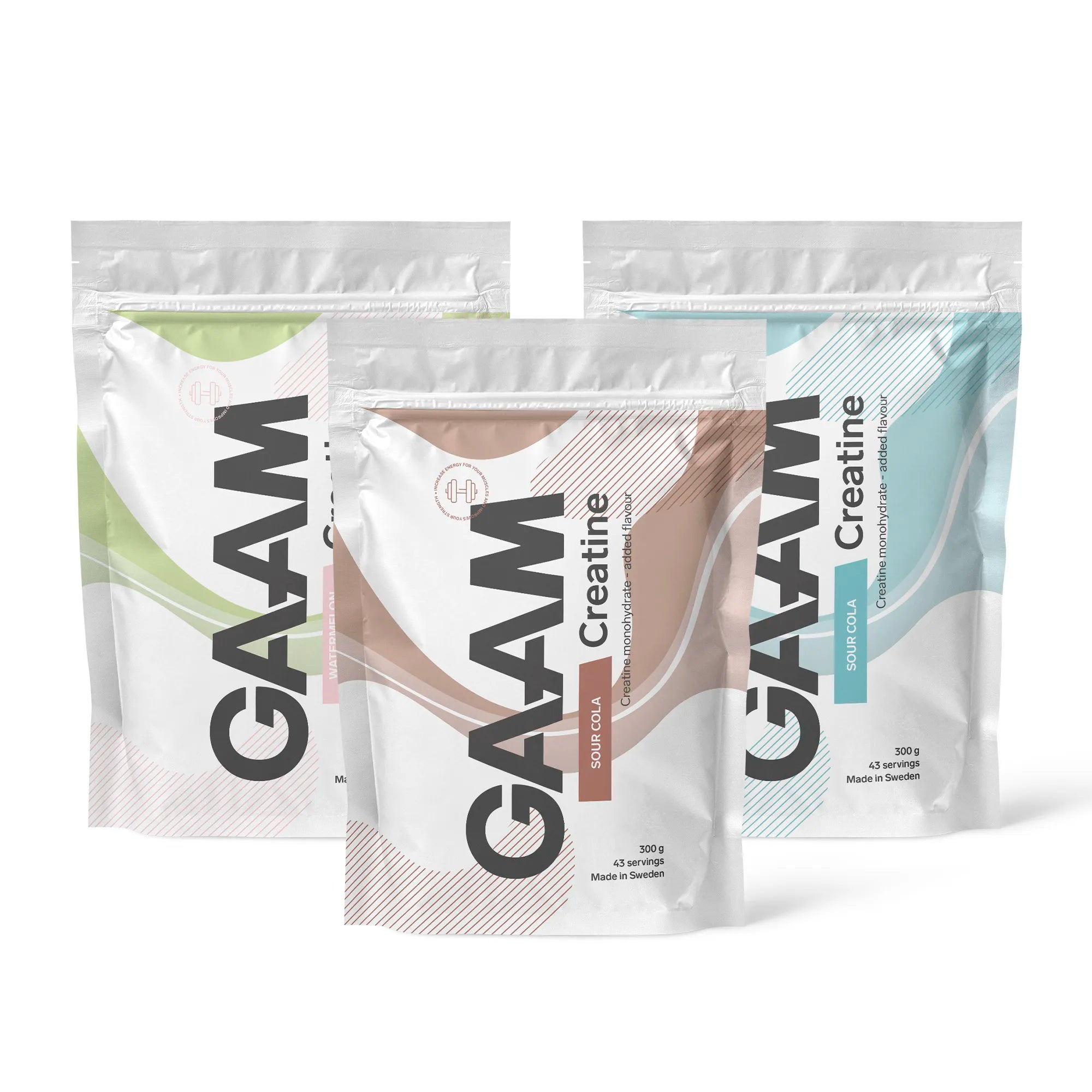 3 x GAAM Creatine 300 g kolmessa valkoisessa pussissa ruskeilla, vihreillä ja sinisillä yksityiskohdilla eri mauille.