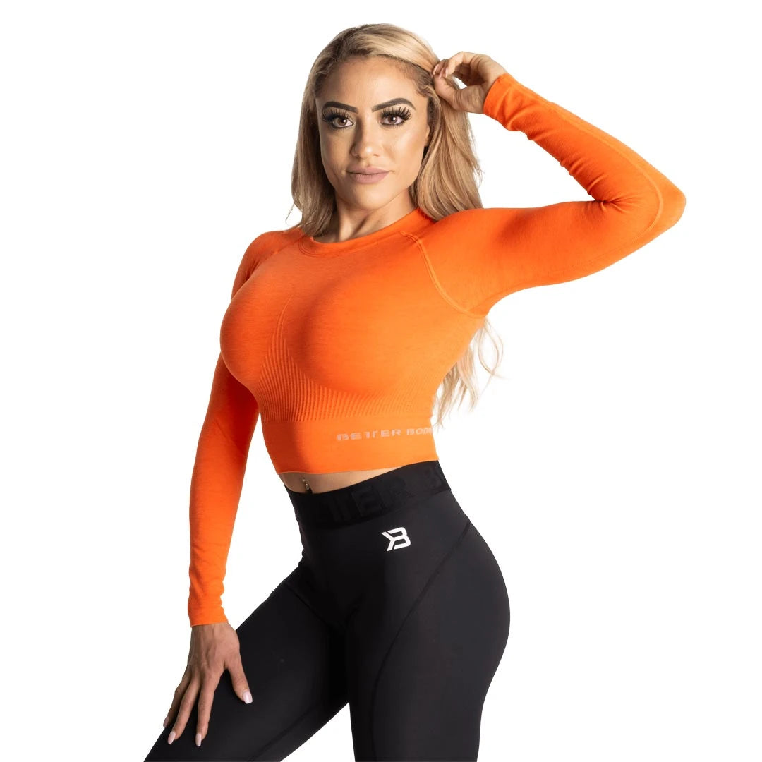 Oranssi Better Bodies Rib Seamless Crop LS Sunset Melange, pitkähihainen ja joustinneulottu croptop mallin yllä., kuva 2/2