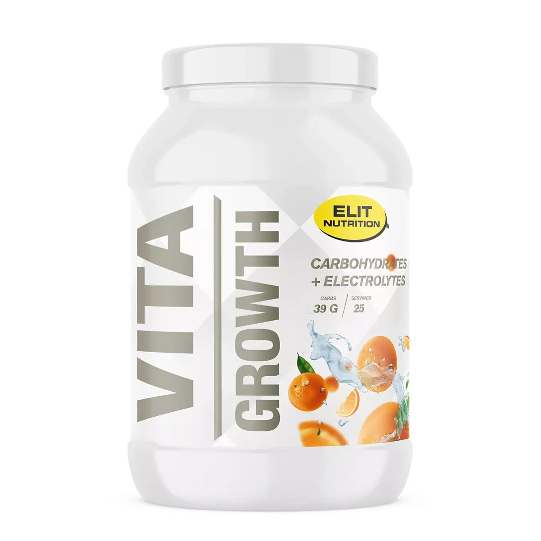 Elit Nutrition Vita Growth 1 kg -hiilihydraatit valkoisessa purkissa, jossa on graafisia appelsiineja ja vesiroiskeita.