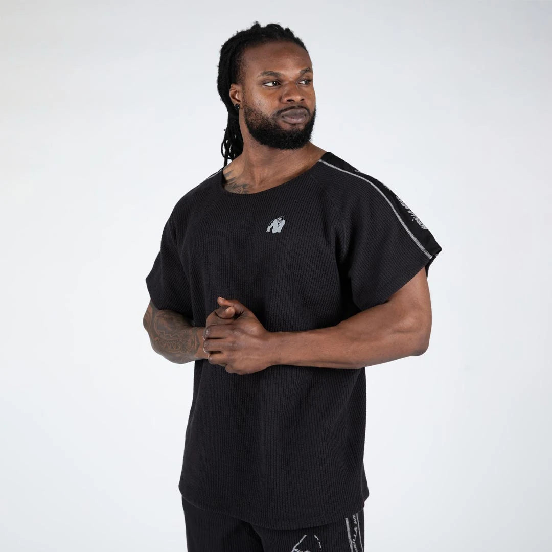 Ribbineulottu ja oversized-mallinen Gorilla Wear Buffalo Old School Workout Top black/grey -treenipaita miehen yllä., kuva 3/5