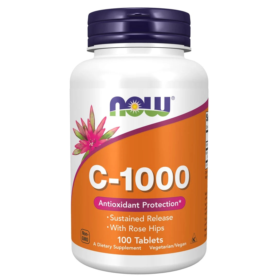 NOW Vitamin C-1000 Sustained Release 100 tabs valkoisessa purkissa, jossa on oranssi etiketti ja tummansininen kansi.