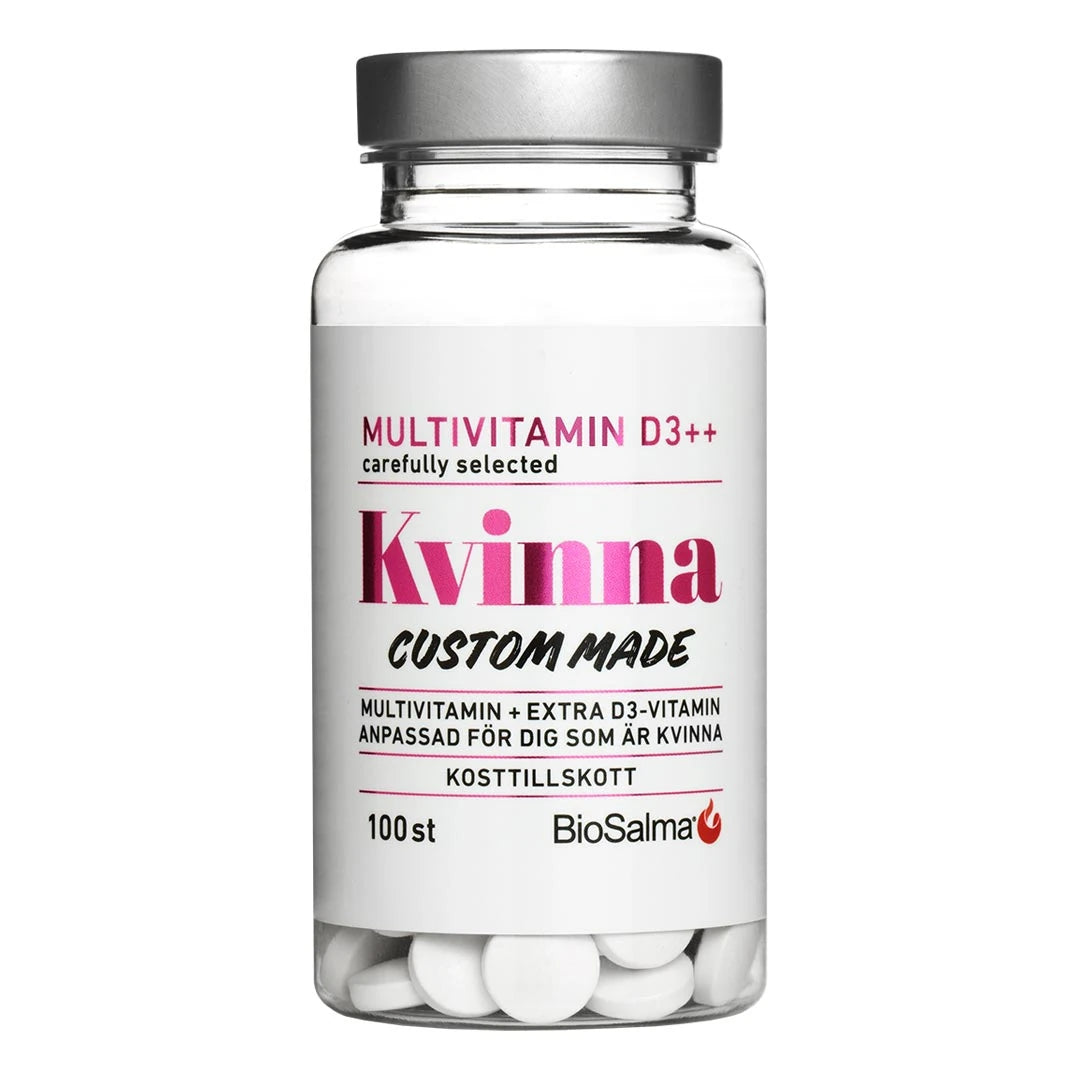 BioSalma Multivitamin Kvinna D3++ 100 tabs läpinäkyvässä purkissa, valkoinen etiketti, pinkit yksityiskohdat ja hopeakansi.
