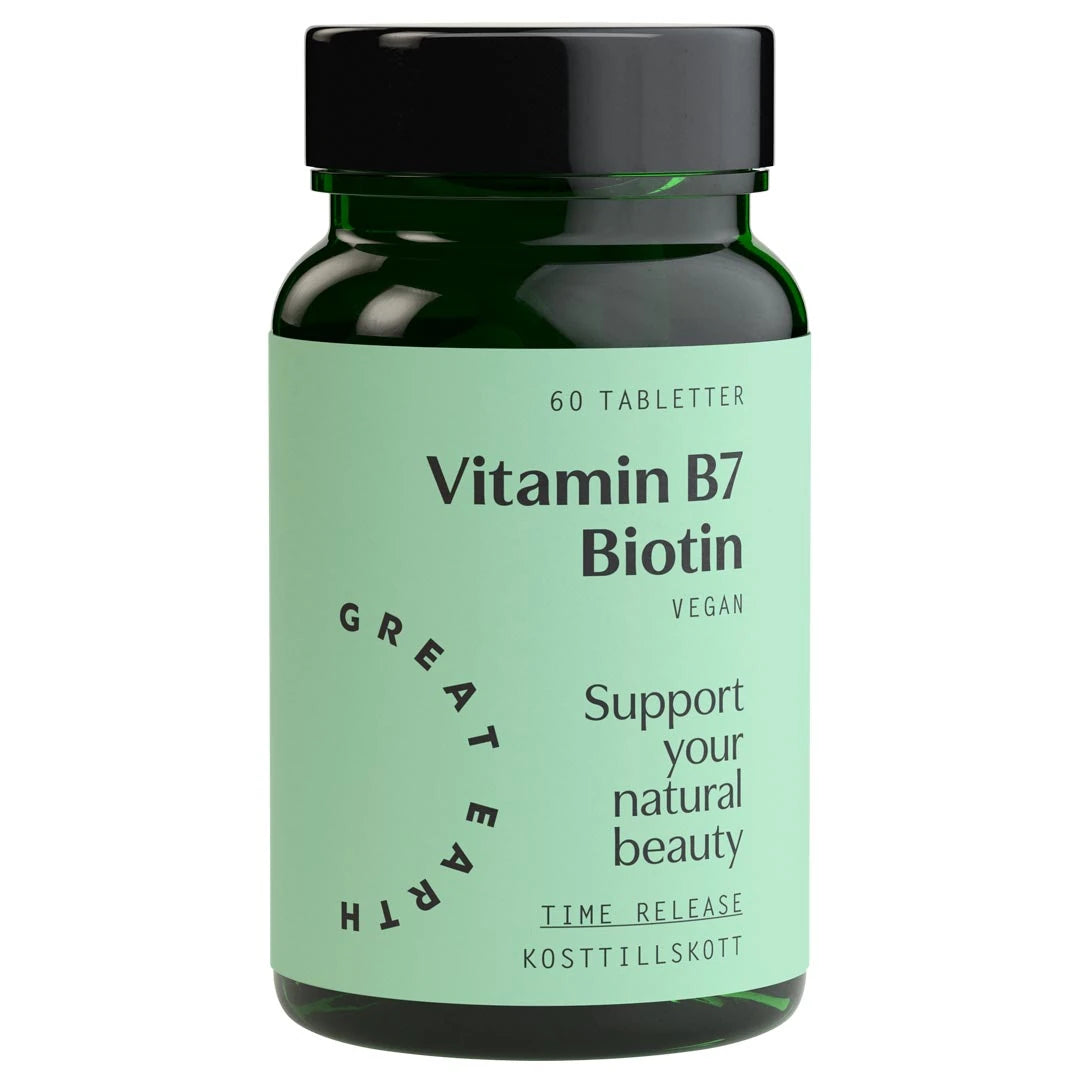 Great Earth Vitamin B7 - Biotin 60 tabs tummanvihreässä purkissa, jossa on vaaleanvihreä etiketti ja musta kansi.