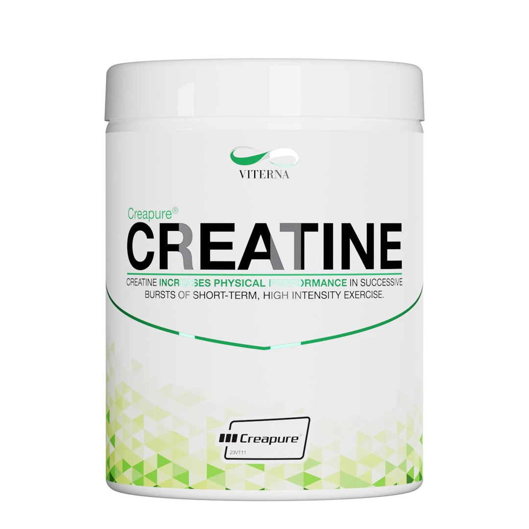 Viterna Creapure 500 g -kreatiinijauhe valkoisessa purkissa, jossa on vihreä geometrinen kuvio.