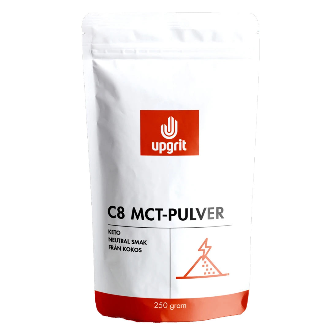 Upgrit C8 MCT-jauhe 250 g tyylikkäässä valkoisessa pussissa punaisilla yksityiskohdilla.