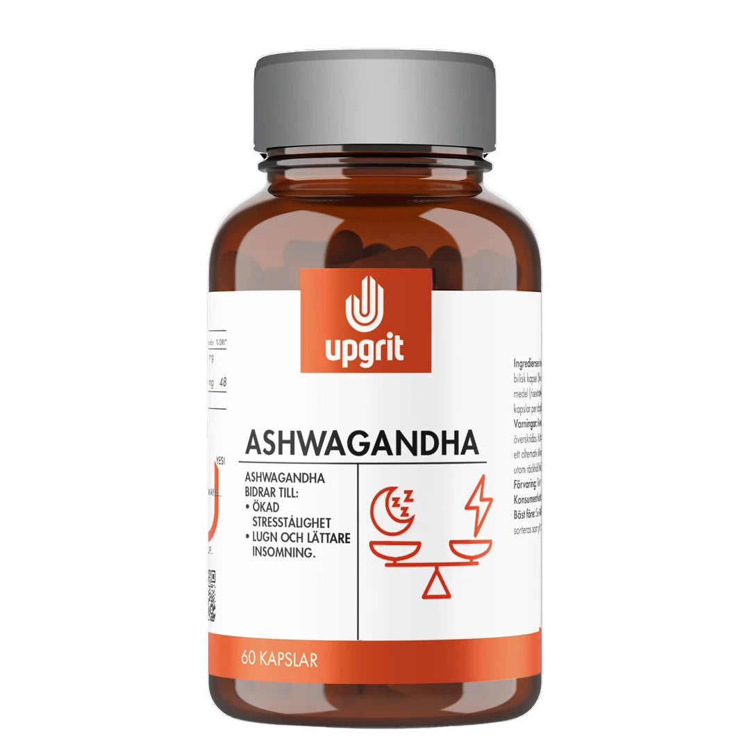 Upgrit Ashwaganda 60 caps ruskeassa purkissa valkoisella ja oranssilla etiketillä, edistämään stressinsietokykyä.