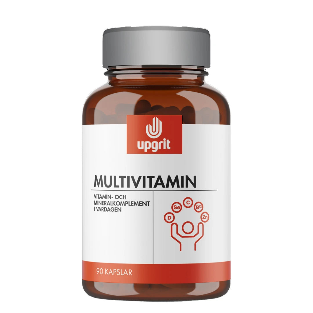 Upgrit Multivitamin 90 caps tummanruskeassa purkissa, jossa on harmaa kansi ja valkoinen etiketti punaisin yksityiskohdin.