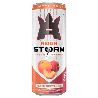 Valkoinen ja oranssi tölkki Reign Storm Energy 355 ml -energiajuomaa makuna Peach Nectarine.