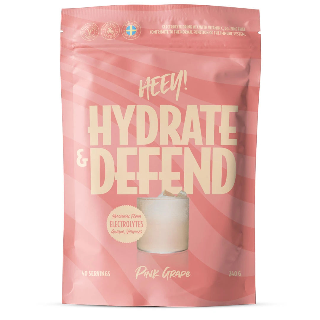 Heey! Hydrate & Defend Electrolytes + Immune Support 240 g -elektrolyyttijauhe pinkissä pussissa, makuna Pink Grape.