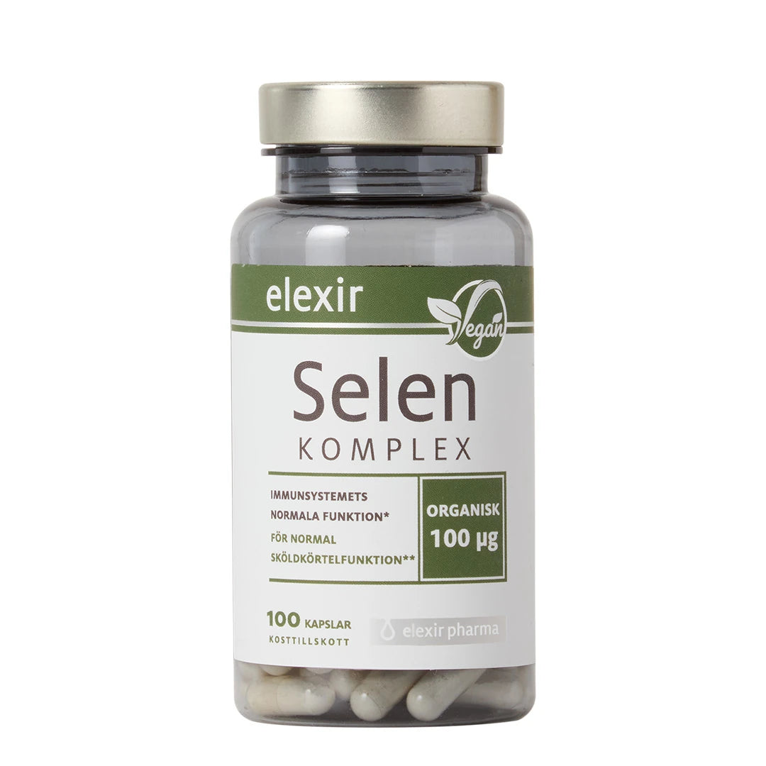Elexir Pharma Selen Komplex 100 caps läpinäkyvässä, hopeakantisessa muovipurkissa vihreävalkoisella etiketillä.