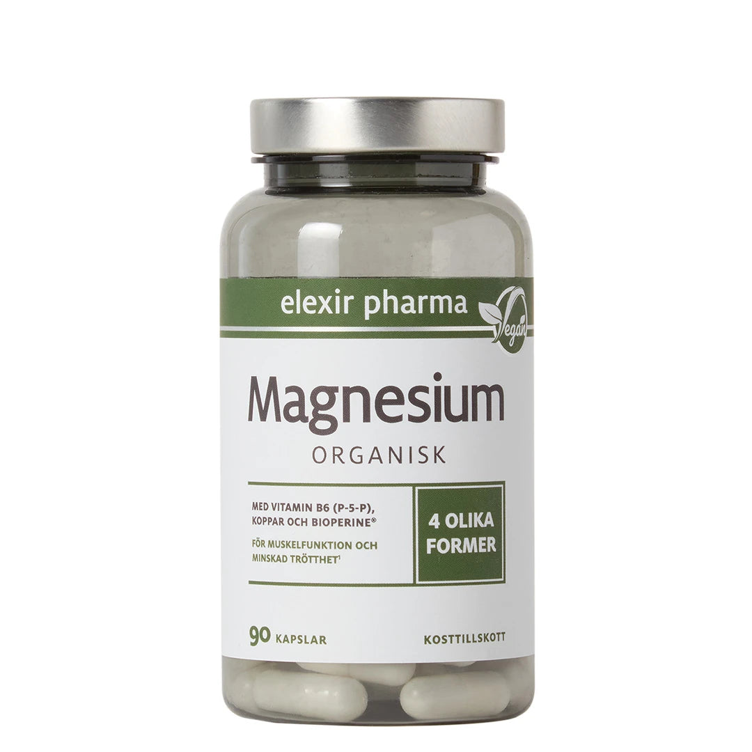 Elexir Pharma Magnesium Organisk 90 caps läpinäkyvässä purkissa, jossa on hopeinen kansi ja valkoinen etiketti vihreillä yksityiskohdilla.