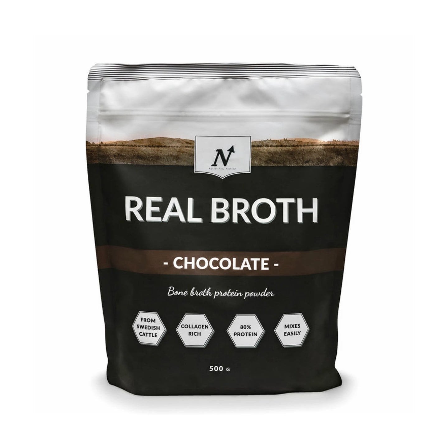 Nyttoteket Real Broth 500 g -luuliemijauhe mustavalkoisessa pussissa ruskeilla yksityiskohdilla, makuna Chocolate., kuva 2/2