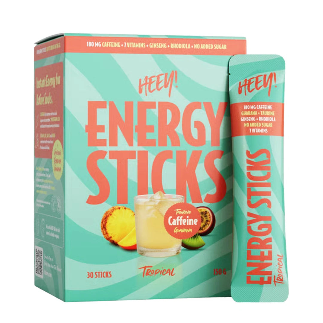 Heey! Energy Sticks Koffein + Guarana turkoosissa rasiassa ja annostikussa, makuna Tropical.