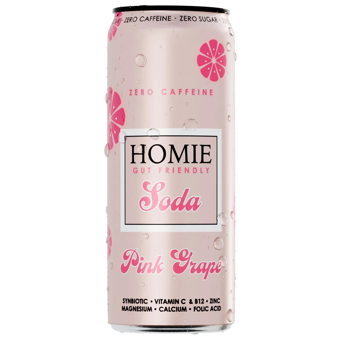 Homie Soda Synbiotic 330 ml -vitamiinijuoma vaaleanpunaisessa tölkissä vesipisaroilla, makuna Pink Grapefruit.