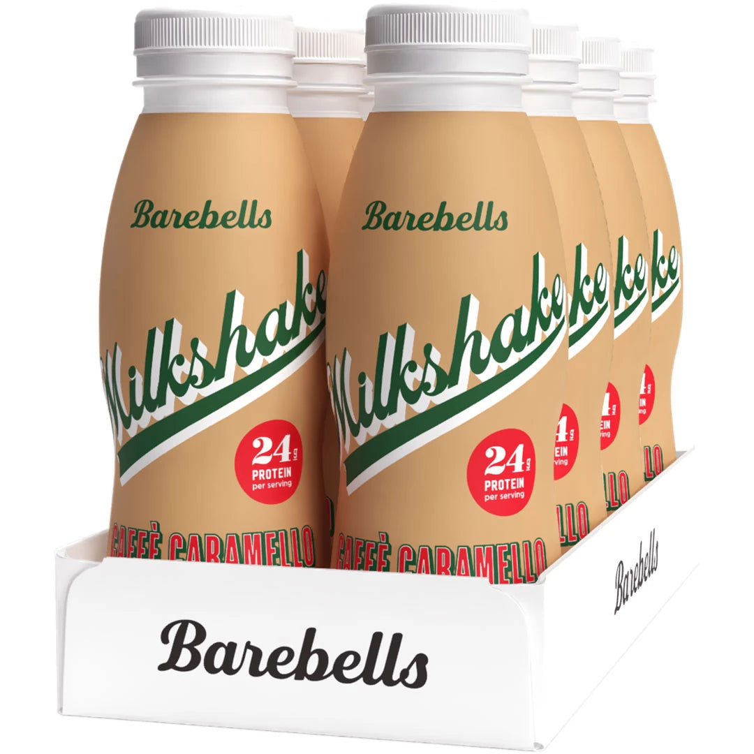 8 x Barebells Milkshake 330 ml Caffé Caramello valkoisessa rasiassa, jossa on vaaleanruskeita pulloja vihreillä yksityiskohdilla.