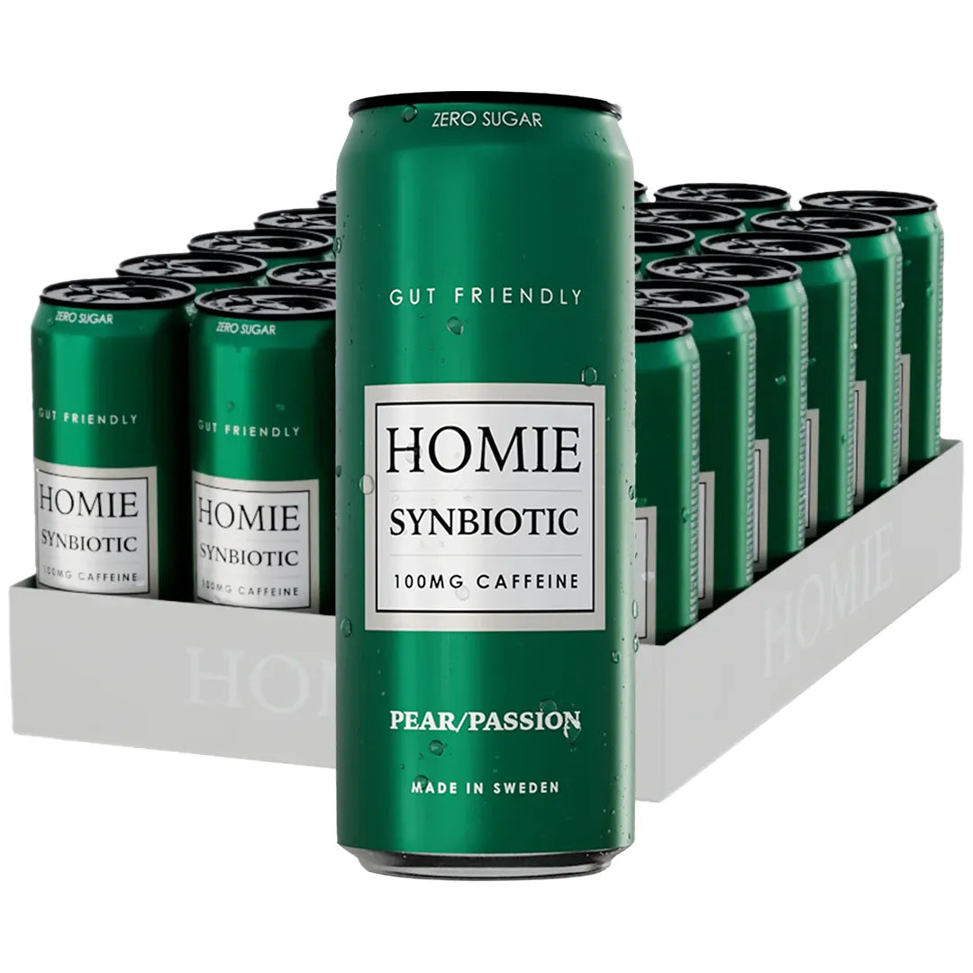 24 x Homie Wake Up Synbiotic 330 ml Pear Passion vaaleassa pahvilaatikossa, joka on täynnä tummanvihreitä tölkkejä.