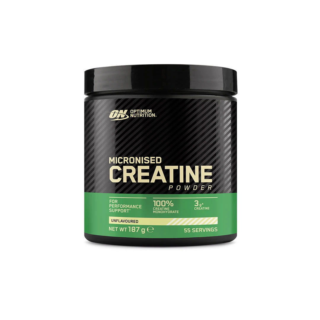 Optimum Nutrition Creatine Powder 187 g mustassa purkissa vihreällä etiketillä, täynnä puhdasta, maustamatonta kreatiinimonohydraattia.