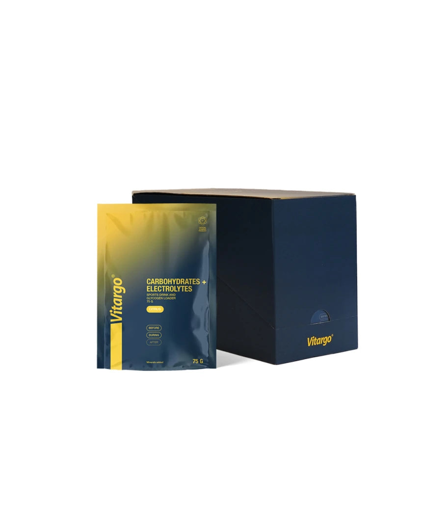 Tummansininen laatikko ja kelta-sininen pussi Vitargo Carb + Electrolytes 15 x 75 g -urheilujuomajauhetta makuna Citrus.