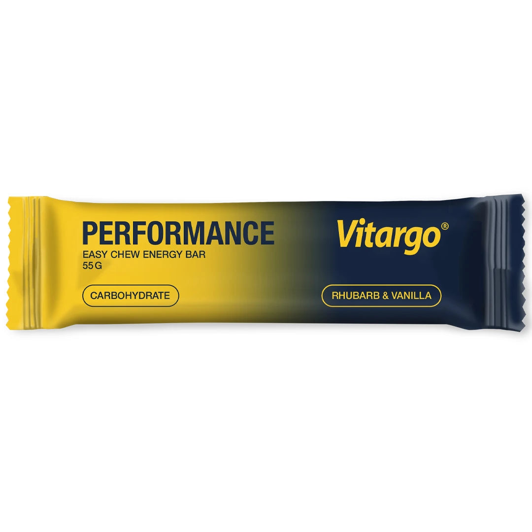 Vitargo Performance Bar 55 g -energiapatukka keltaisessa ja tummansinisessä pakkauksessa, makuna Rhubarb & Vanilla.