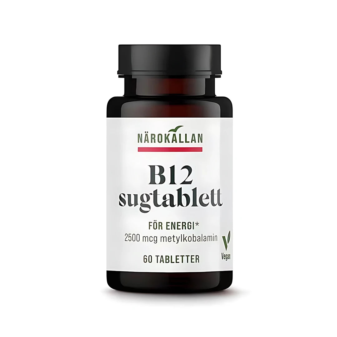 Närokällan B12 Sugtablett 60 tabs tummassa purkissa, jossa on valkoinen etiketti ja musta kansi.