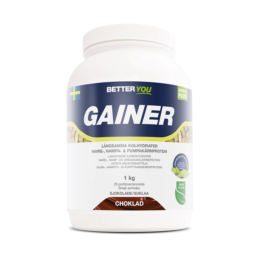 Better You Whole Food Gainer 1kg -vegaanigaineri valkoisessa purkissa sinisillä yksityiskohdilla, makuna suklaa.