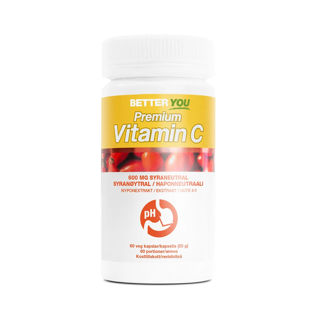Better You Premium Vitamin C - 60 kaps valkoisessa purkissa, jossa on keltainen etiketti ja punaisia ruusunmarjoja.