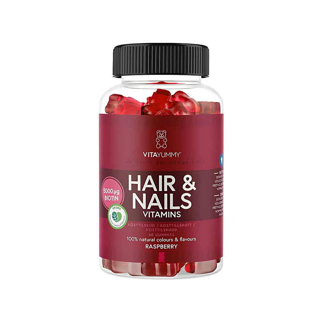 VitaYummy Hair & Nails Vitamin 60 pcs, punaisia vitamiinikumeja läpinäkyvässä purkissa viininpunaisella etiketillä.