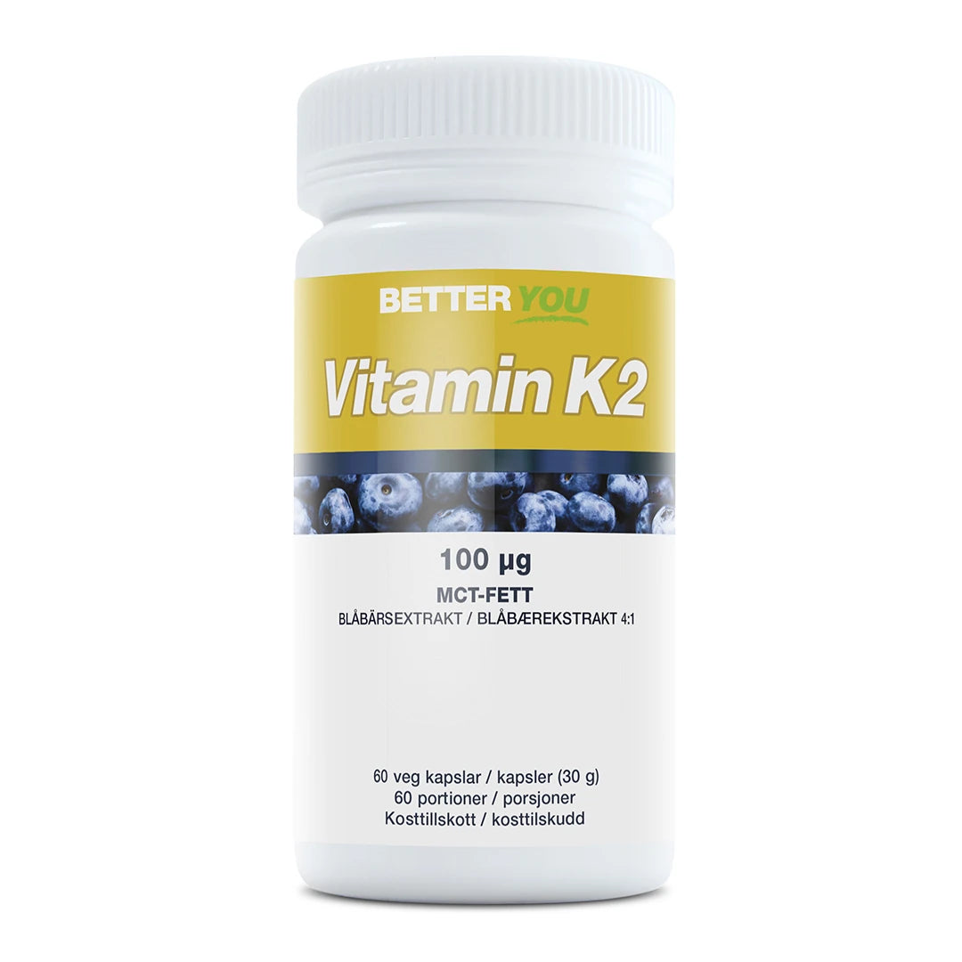 Better You Vitamin K2 100 µg - 90 kaps -ravintolisä valkoisessa purkissa keltaisella etiketillä ja mustikkakuviolla.