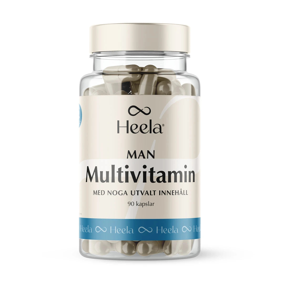 Heela Multivitamin Man 60 caps läpinäkyvässä muovipurkissa, jossa on vaaleanbeige ja sininen etiketti sekä vaalea kierrekorkki.
