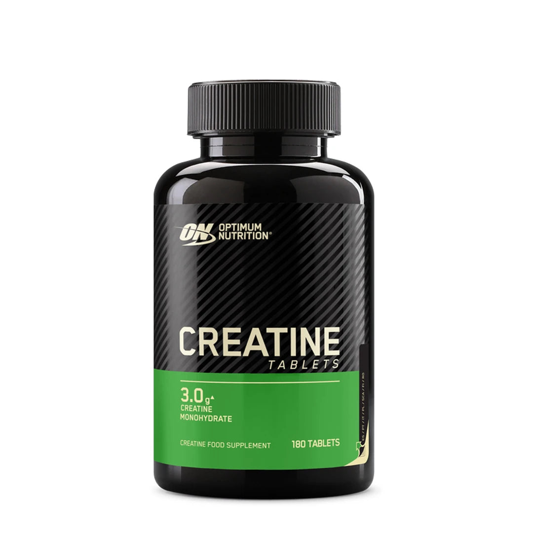 Optimum Nutrition Creatine Tablets 180 tabs mustassa purkissa, jossa on vihreä etiketti.