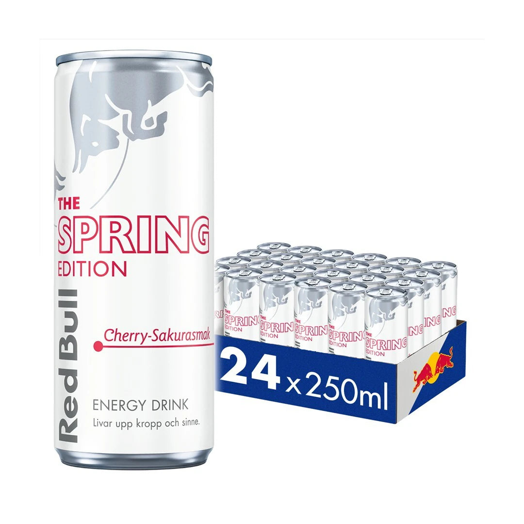 24 x Red Bull 250 ml Spring Edition Cherry-Sakura sinisessä laatikossa valkoisia ja pinkkejä energiajuomatölkkejä.
