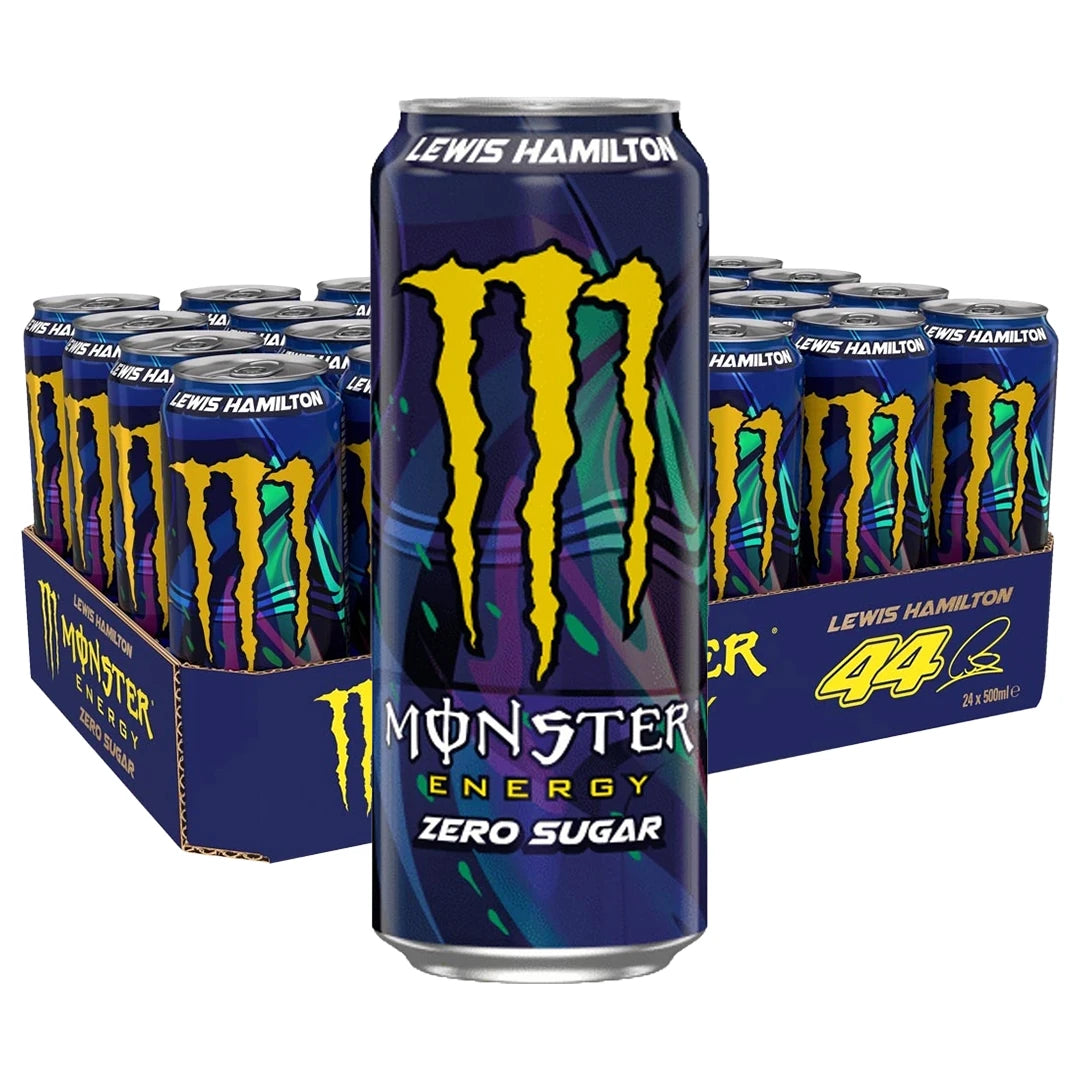 24 x Monster Energy 500 ml Lewis Hamilton (sokeriton) tummansinisessä laatikossa olevia värikkäitä energiajuomatölkkejä.
