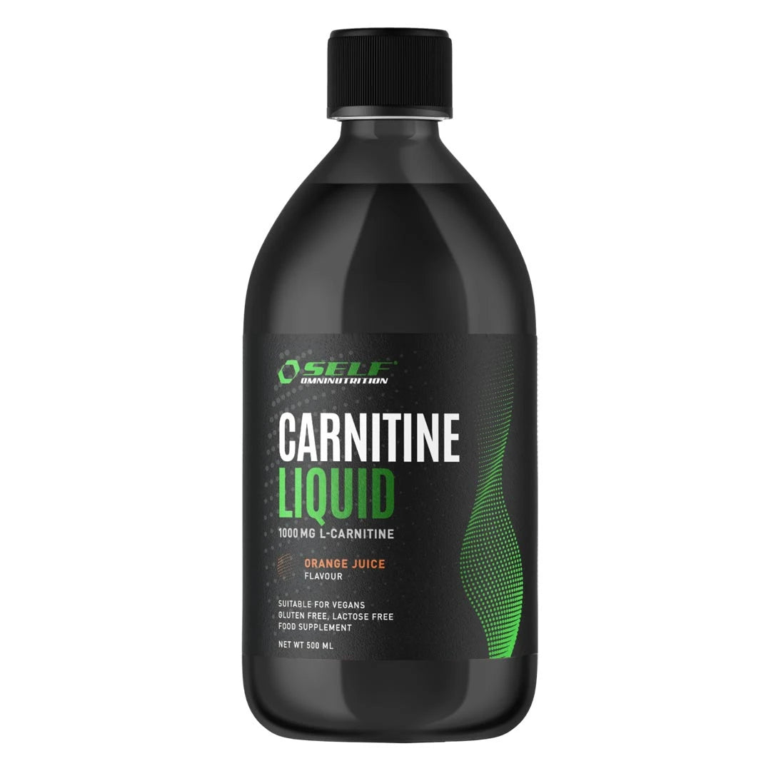 Musta pullo appelsiininmakuisia Self Omninutrition Carnitine Liquid 500 ml -nestemäisiä aminohappoja.