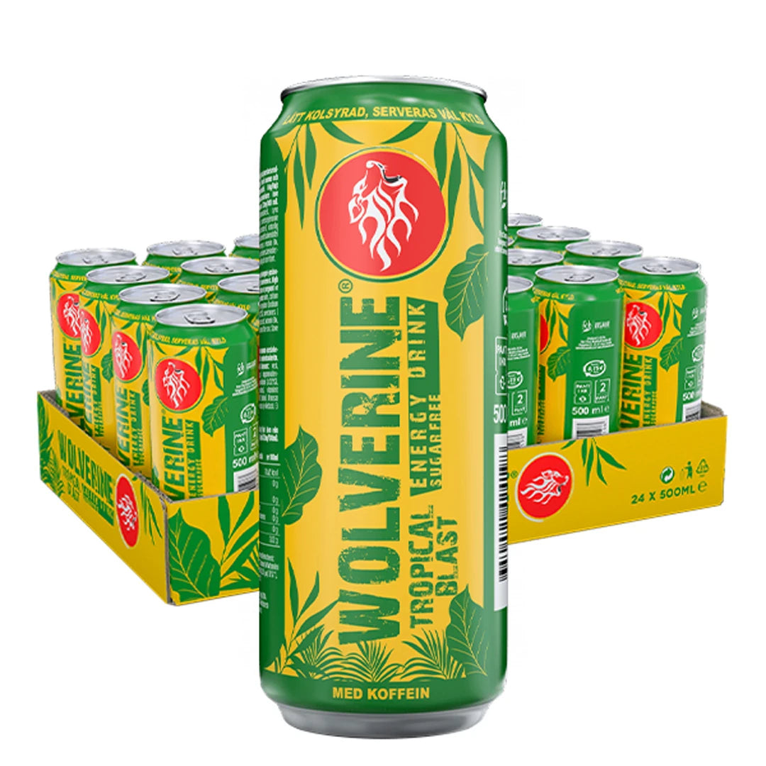 24 x Wolverine Energy Drink 500 ml Tropical Blast keltaisessa laatikossa, täynnä viherkeltaisia lehtikuvioisia tölkkejä.
