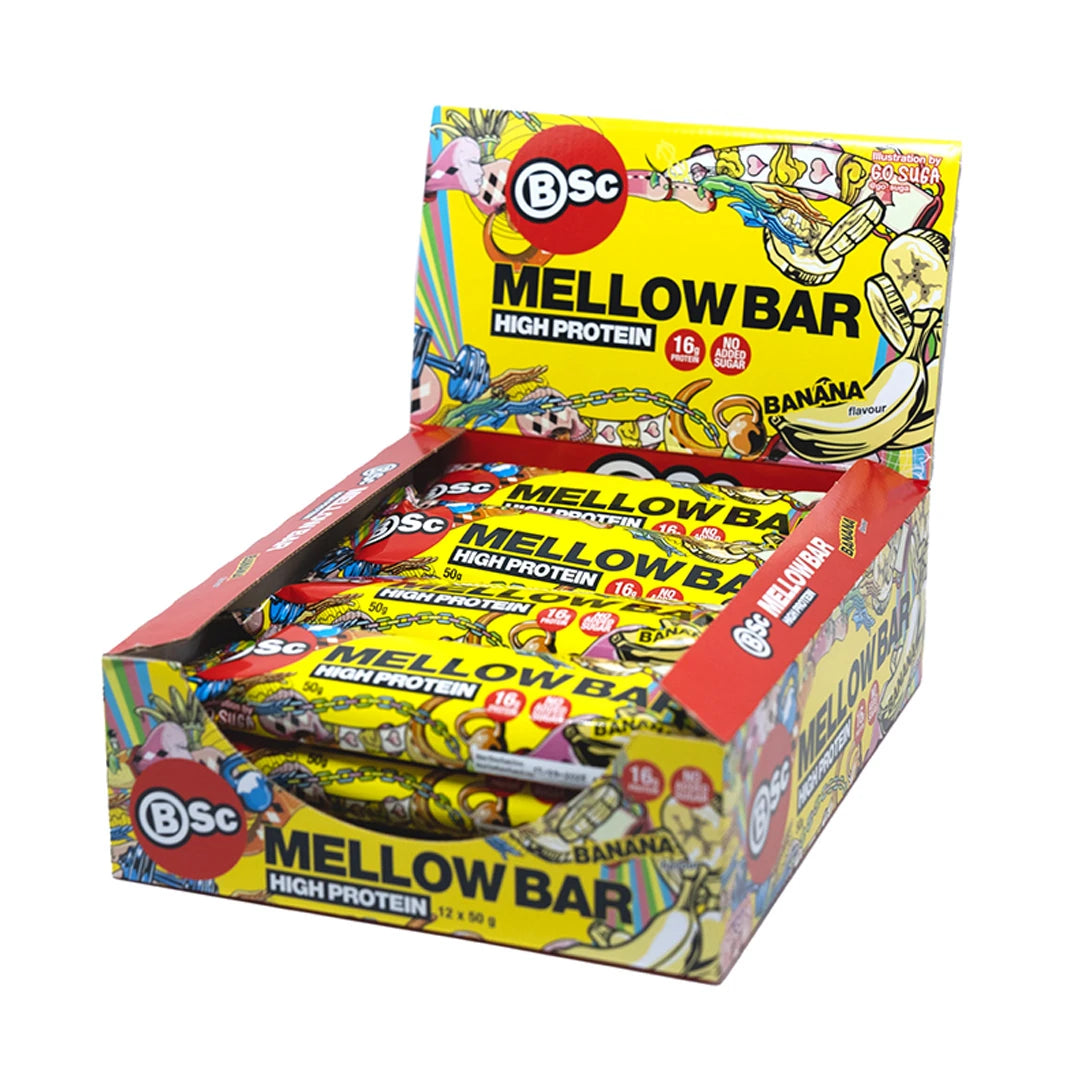 12 x BSc Mellow Proteinbar 50 g lajitelmalaatikko keltaisessa esittelylaatikossa värikkäillä banaanimakukuvioilla.