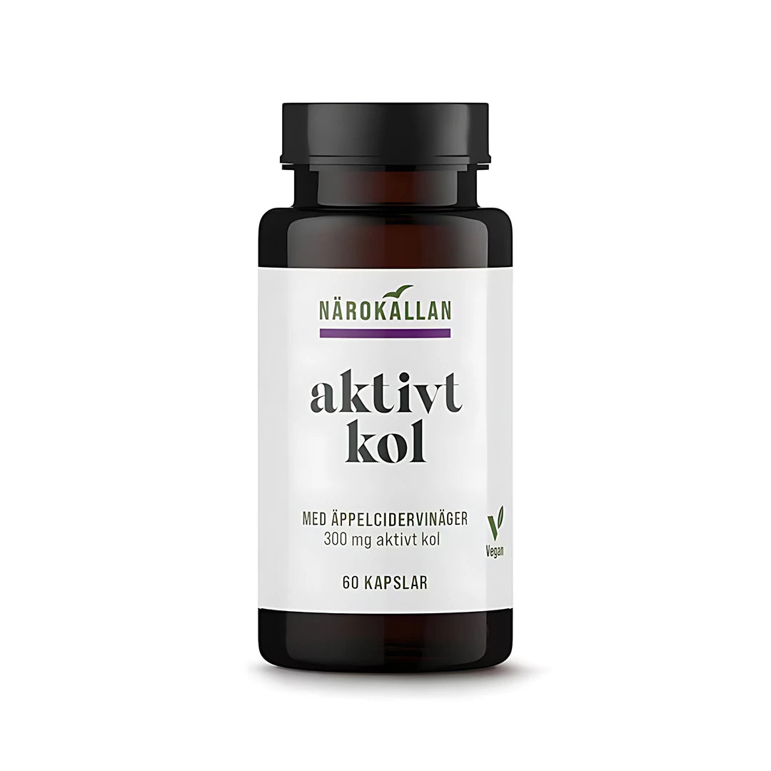 Närokällan Aktivt kol + Äppelcidervinäger 60 caps tummassa purkissa valkoisella etiketillä.