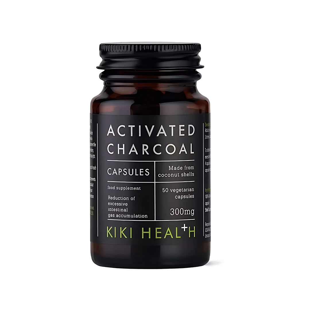 KIKI Health Activated Charcoal 50 caps tummassa lasipurkissa, jossa on musta etiketti ja valkoisia yksityiskohtia.