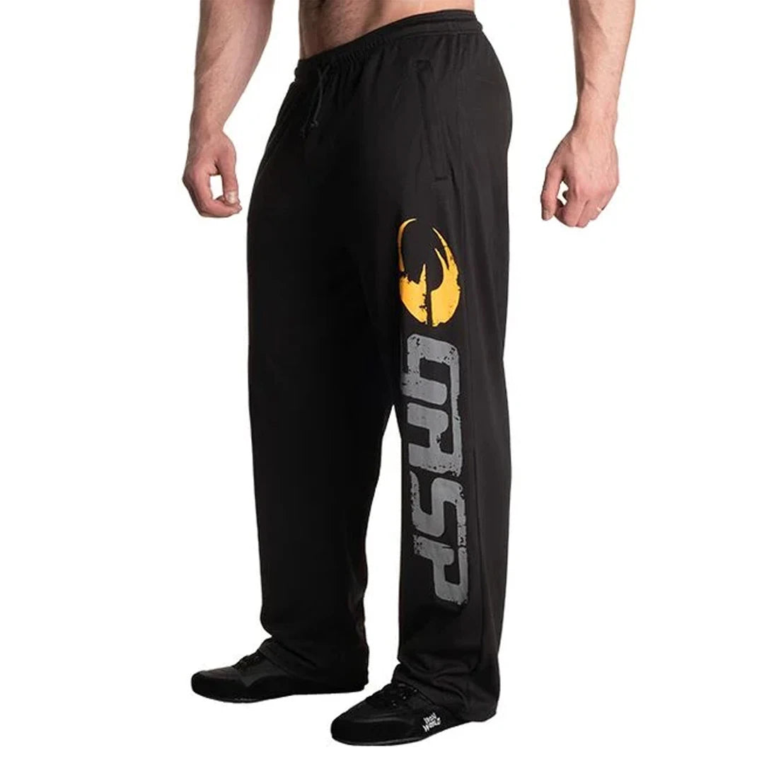 GASP Original Mesh Pants Black, mustat rennosti istuvat treenihousut, joissa suuri logo vasemmassa lahkeessa., kuva 6/6