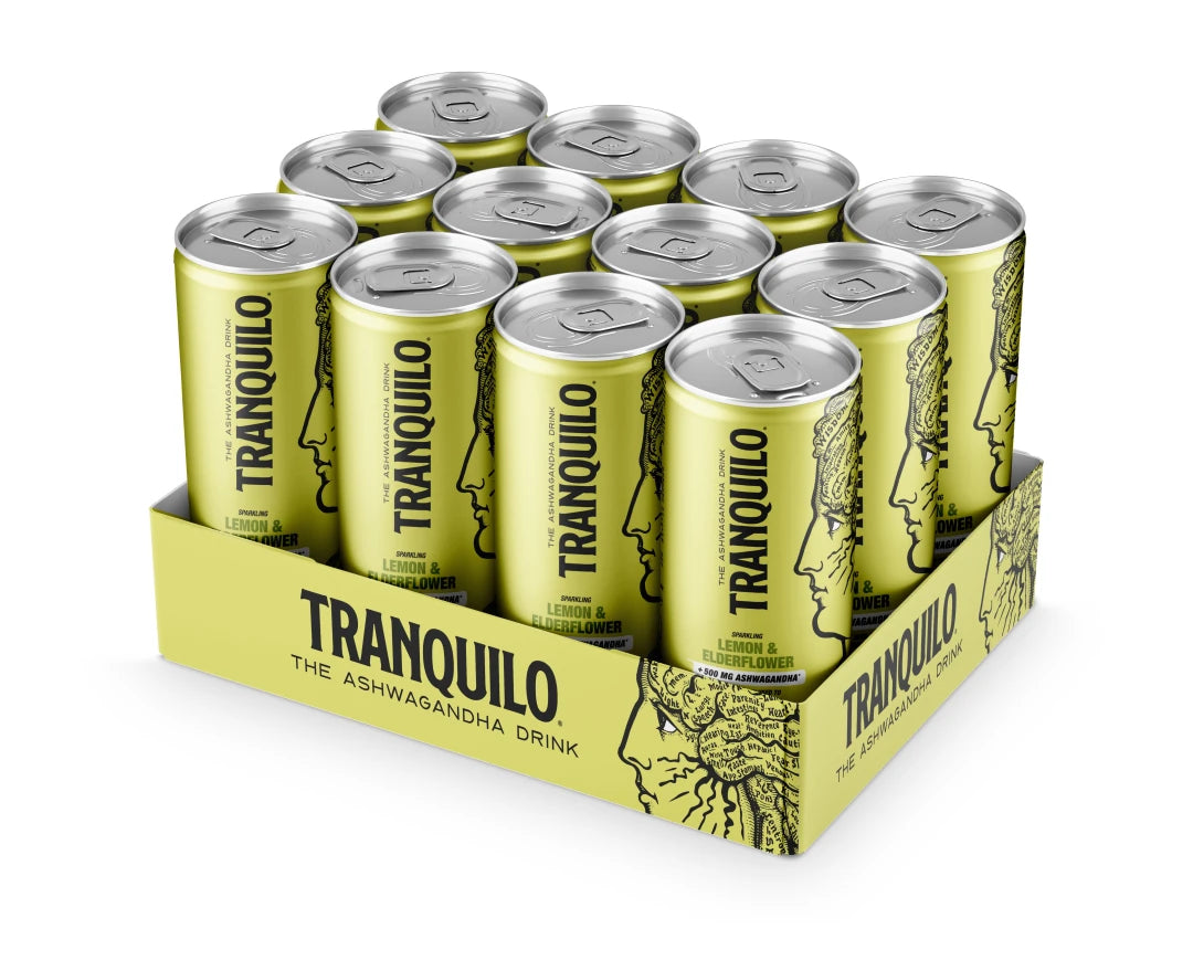 12 x Tranquilo 330 ml Sitruuna/seljankukka keltaisessa laatikossa, jossa on keltaisia tölkkejä ja kasvokuvituksia.