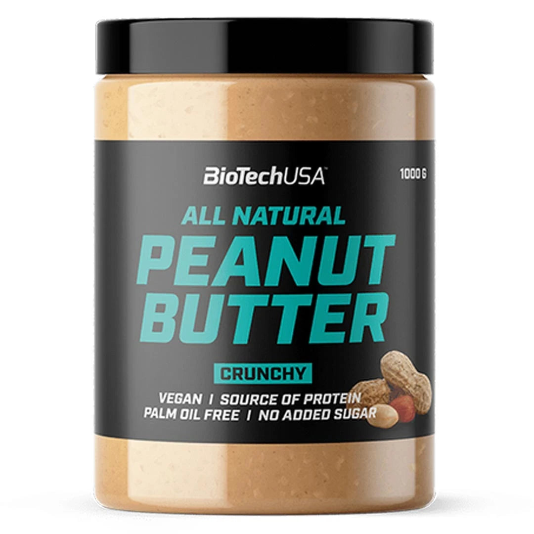 BioTechUSA Peanut Butter 1 kg läpinäkyvässä purkissa mustalla etiketillä ja turkoosilla tekstillä Crunchy-maussa.