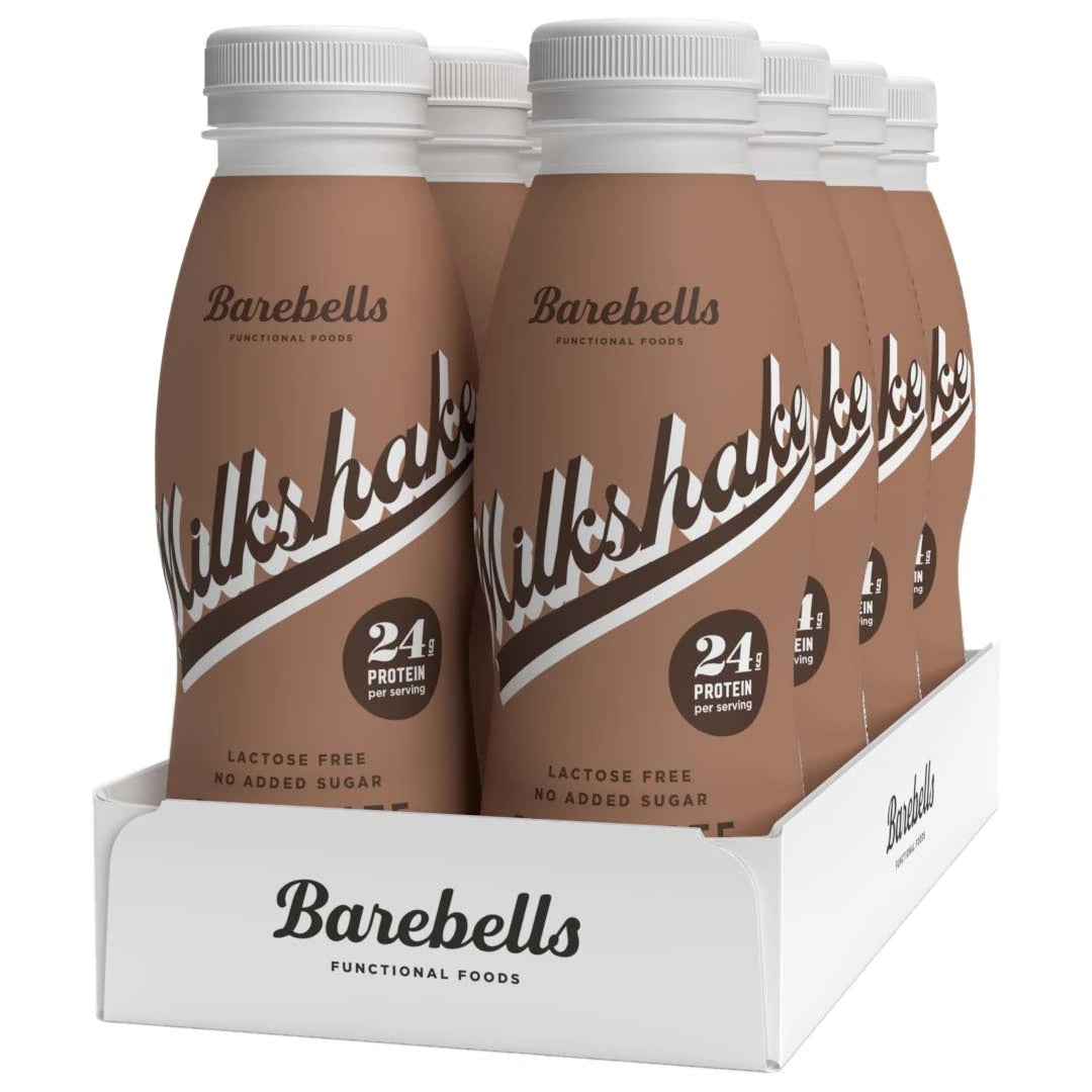 8 x Barebells Milkshake 330 ml Chocolate valkoisessa laatikossa, jossa on kahdeksan ruskeaa proteiinipirtelöpulloa.
