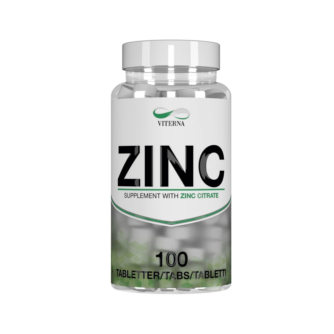 Viterna Zinc 100 caps läpinäkyvässä purkissa, jossa valkoinen etiketti, vihreitä yksityiskohtia ja valkoisia tabletteja.